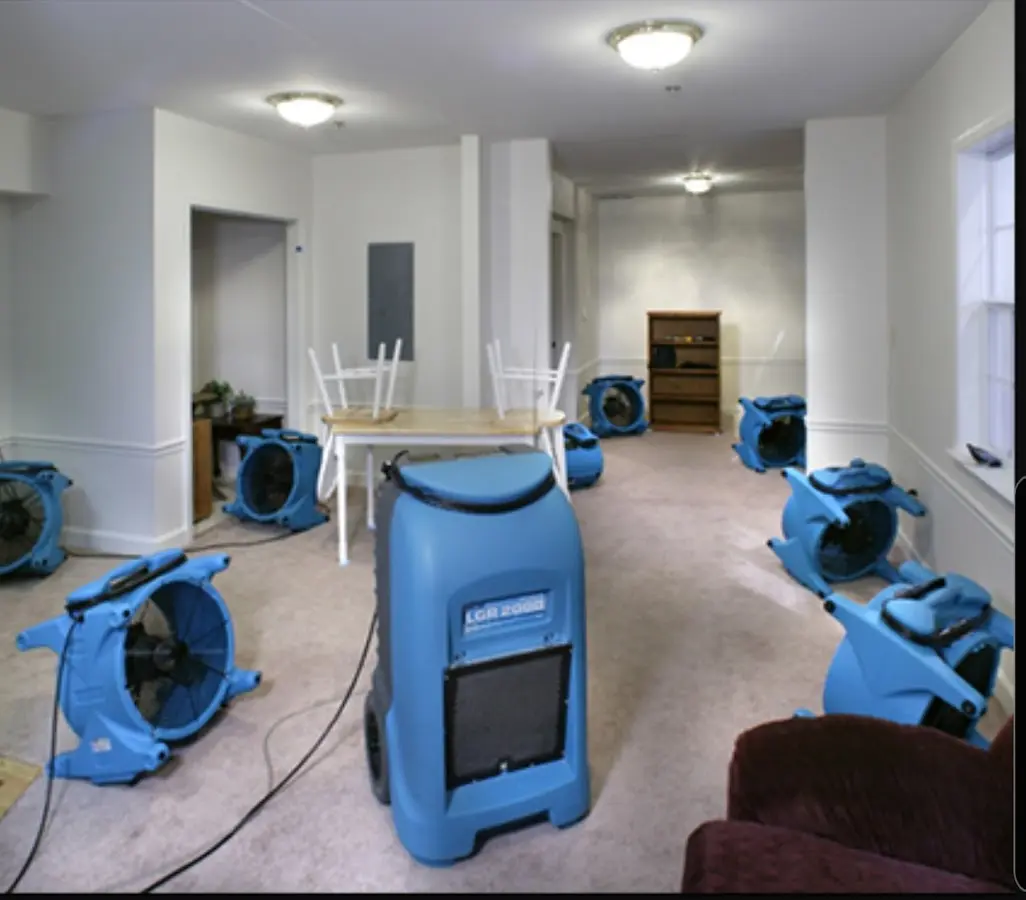 Air movers and dehumidifier setup for Water Damage Restoration in Angleton
